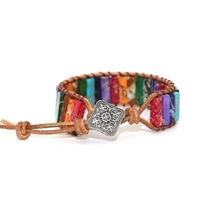 Detail of colorful imperial stone wrap bracelet with leather cord and vintage metal clasp