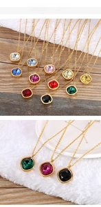 Close-up of 13mm square zircon pendants in multiple colors with gold cross chains