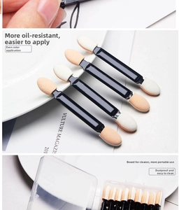 Close-up of double-sided sponge eyeshadow applicators in a clear storage case