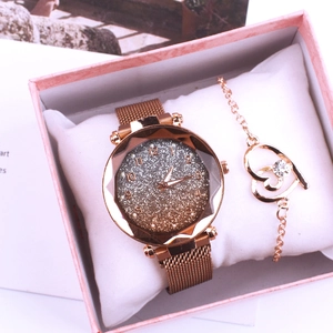 Ladies rose gold magnetic watch with starry dial and heart bracelet in a gift box