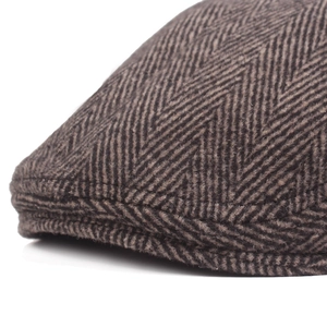 Classic herringbone flat cap in coffee brown tweed featuring a traditional newsboy style