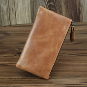 Detailed view of brown crazy horse leather long wallet with vintage metal zipper