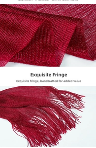 Detail of red metallic mesh evening shawl featuring delicate handmade tassels