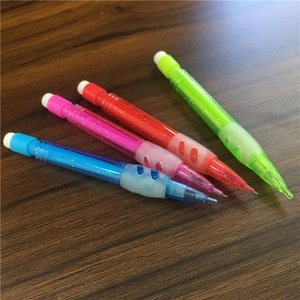 Detailed view of four colorful 0.7mm mini mechanical pencils on a dark wood background