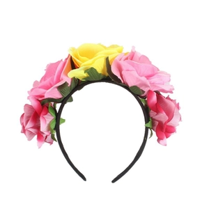 Detail showing pink and yellow fabric rose petals on the Mexican party headband crown