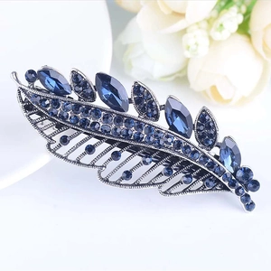 Pince à cheveux feuille argentée avec cristaux bleu foncé et strass élégants