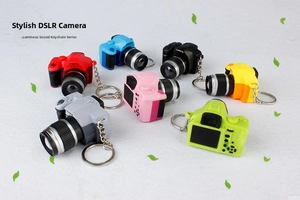 Mini SLR camera keychains in seven vibrant colors with LED lights and sound effects