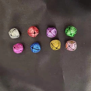 Set of eight colorful metal cross bells for Christmas DIY decor and pet collars