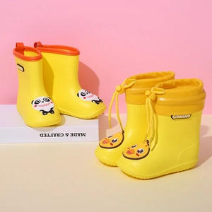 Detail view of yellow duck and panda rain boots for kids with waterproof drawstring design