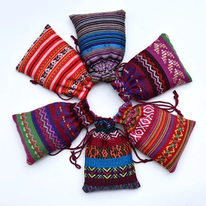 Traditional ethnic style drawstring cotton pouches in various colors and patterns