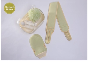Close-up of mustard green exfoliating bath set with back scrubber, glove and mesh sponge
