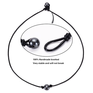 Handmade knotted leather cord necklace with single black shell pearl and secure closure