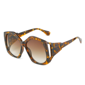 Fashionable oversized tortoise shell sunglasses with trendy hollowed-out temple design