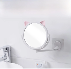 Wall-mounted cat ear vanity mirror with extendable arm and rotatable white frame