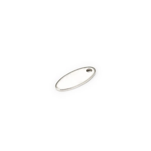 Close-up of polished oval stainless steel pendant with pre-drilled hole for DIY jewelry