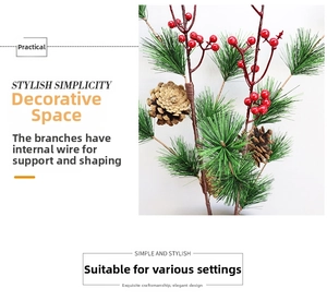 Detail of pine branch with red berries and flexible iron wire core for easy shaping