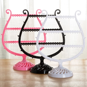 Three-tier harp-style jewelry organizer stand for earrings and bracelets in three colors
