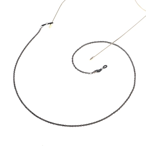 Elegant black and gold twisted metal eyeglass chain lanyard with non-slip rubber loops