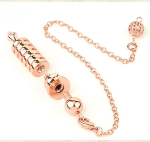 Detail view of detachable rose gold aura healing pendulum with modular screw parts and chain