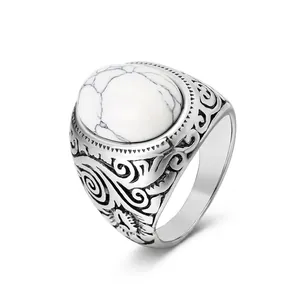 Vintage stainless steel ring for men featuring retro patterns and white turquoise gemstone