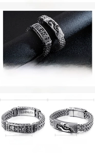 Detail view of vintage stainless steel bracelets with mechanical gear and Buddhist motifs