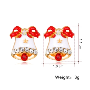 Detail of Christmas bell stud earrings with white enamel, red bow, and rhinestone accents