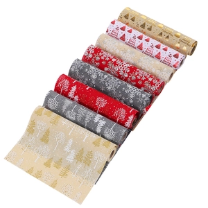 Christmas table runner linen rolls with festive tree and snowflake prints in red and grey