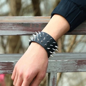 Men's punk leather bracelet with three rows of silver cone spikes and rivets