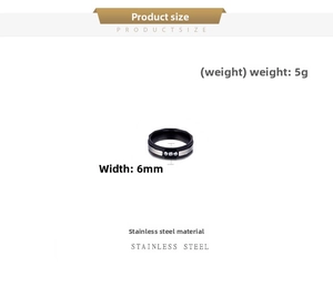 Detail view of 6mm two-tone stainless steel ring with three small diamonds, weighing 5g