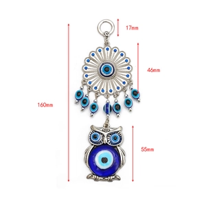Detail view of silver owl keychain with blue evil eye beads showing dimensions 160mm total