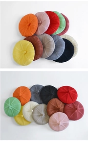 Detailed knit texture and top handle of the children's knitted beret hat in various colors