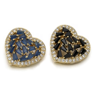 Macro shot of heart-shaped gold connectors with blue and black zircon crystal stones