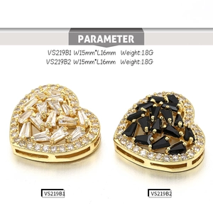 Macro detail of 15mm heart connectors with sparkling zircon stones in gold finish