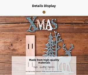 Detail view of DIY wooden Christmas XMAS tabletop ornament with reindeer and tree pieces