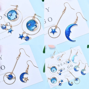 8-piece set of celestial blue enamel star moon and planet alloy charms for DIY jewelry