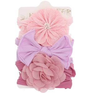 Set of 3 stretchy nylon baby headbands with flowers and bows on display card