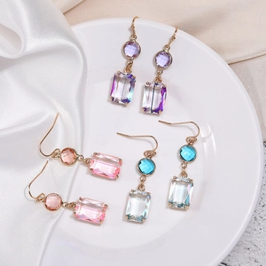 Long geometric crystal drop earrings in purple pink and blue with gold plated hooks