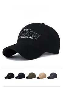 Detail of cotton baseball cap with white Sport 3D embroidery on black twill fabric