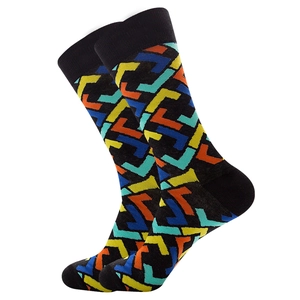 Close-up of geometric L-shaped pattern on knitted crew socks with ribbed cuffs