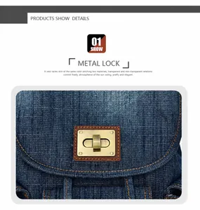 Détail du fermoir tournant en métal doré sur sac à dos en jean bleu avec coutures orange