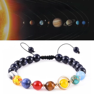 Solar system bracelet with nine natural stones representing planets on adjustable cord