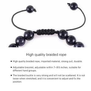 Detail of blue sandstone beads and adjustable black woven nylon cord on the solar system bracelet