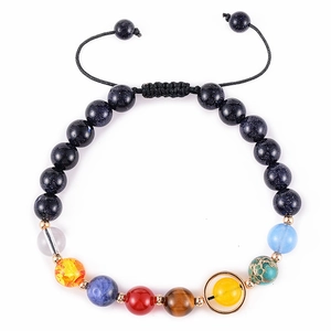Close-up of solar system beaded bracelet with natural blue goldstone and planet stones