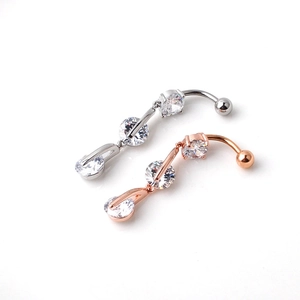 Surgical steel belly button rings with round cubic zirconia in silver and rose gold