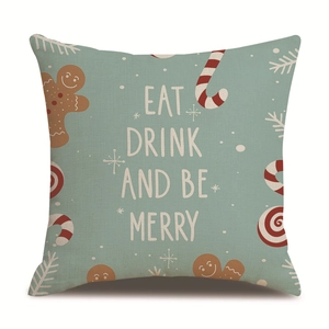 Detail of Christmas linen pillowcase showing gingerbread patterns and Merry text