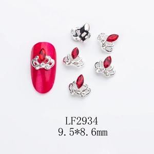 Detailed view of silver crown nail charms with red marquise stone, size 9.5x8.6mm