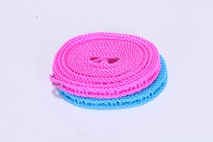 Detail of pink and blue windproof fence-style clotheslines with anti-slip hooks