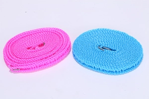 Close-up of pink and blue nylon windproof clotheslines with anti-slip fence design