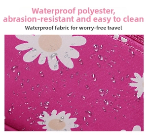 Detail of waterproof polyester cosmetic bag with daisy print and water droplets on surface