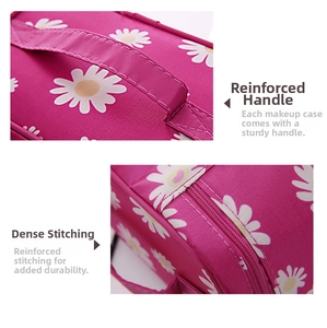 Reinforced handle and precise stitching detail on pink daisy cosmetic toiletry bag